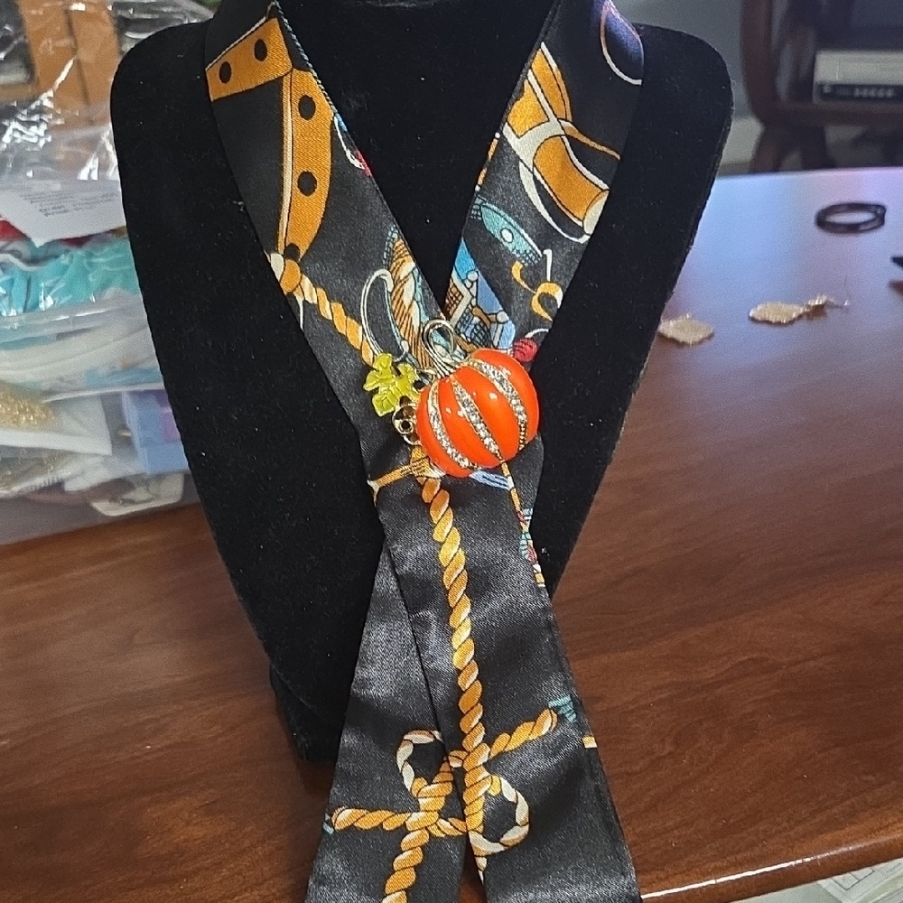 Chic Black and Orange Patterned Scarf